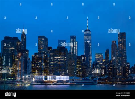 The Lower Manhattan Skyline Seen Across The East River Shows City