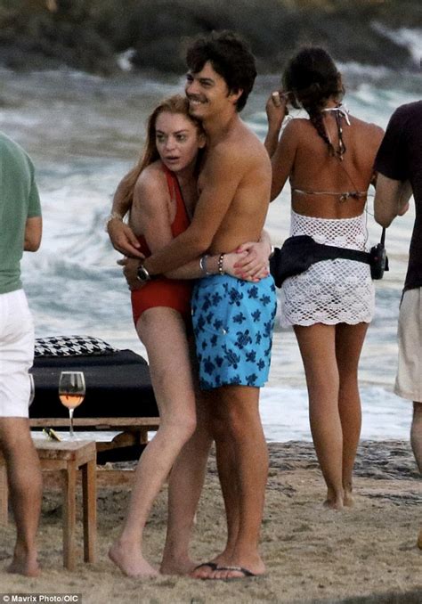 lindsay lohan dons red swimsuit with fiancé egor tarabasov in mykonos daily mail online