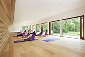 This long view of the yoga studio in full use highlights the breezy ...
