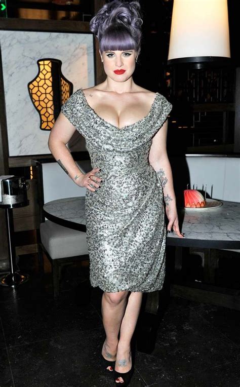 And Breathe In Busty Kelly Osbournes Cleavage Pops Out In Plunging