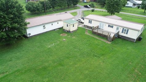 SOLD $195,250 - 2 Income Generating Properties on 1.5 Acres