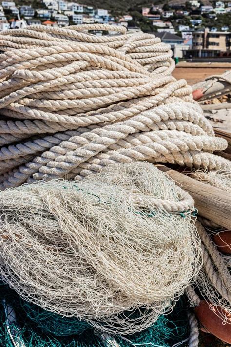 Traditional Fishing Net And Rope On Small Rowing Boat Stock Image