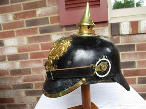 From the german pickel, point or pickaxe, and haube, bonnet, a general word for headgear), also pickelhelm, is a spiked helmet worn in the 19th and 20th centuries by prussian and german military, firefighters and police. Infantry pickelhaube