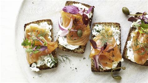 Seeded Bread Tartines With Herbed Goat Cheese And Smoked Salmon