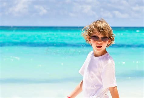 Little Boy Wearing Sunglasses On Tropical Beach Stock Photo Image Of