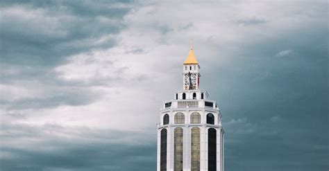 White Building Under Grey Sky · Free Stock Photo