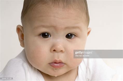 Baby Boy Drooling Portrait Closeup High Res Stock Photo Getty Images