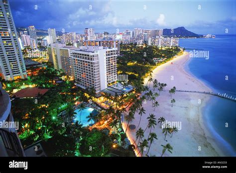 Overview Of Waikiki Beaches With Diamond Head At Twilight Stock Photo