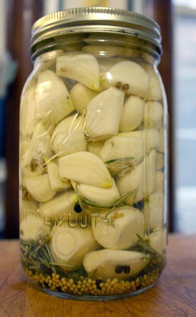 Because when raw garlic interacts with oxygen to produce allcin. pickled garlic cloves by Forkable Blog, via Flickr ...