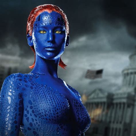 A Woman With Blue Paint On Her Face And Body In Front Of The Capitol Building