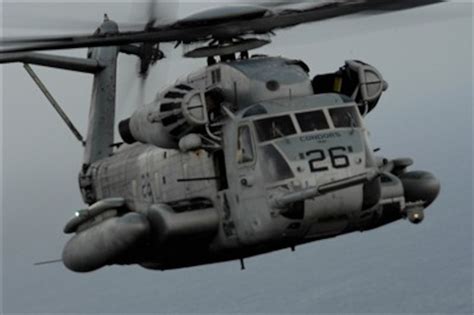 A Us Marine Corps Ch 53 Sea Stallion Helicopter Approaches A Hc 130