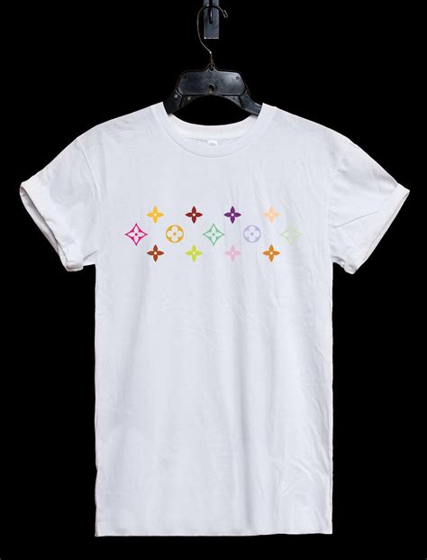 It has short sleeves and a relaxed fit which will look great when paired with printed pants or jeans. LV Pattern Inspired Unisex T-Shirt, Louis Vuitton Shirt ...