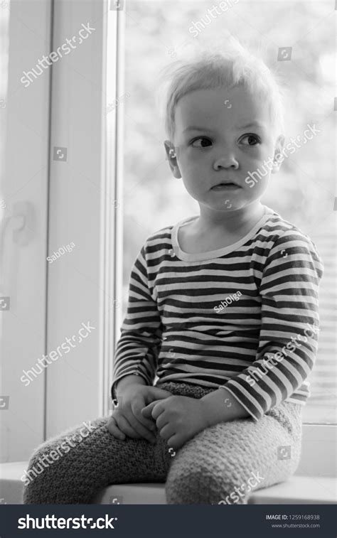 Sad Baby Boy Sitting Near Window Stock Photo Edit Now 1259168938