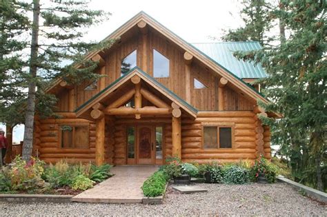 Boomstammen in huis en tuinde tijd van het alleen maar opbranden van bomen in de open haard is voorbij. Boomstam huizen | Canadese log homes
