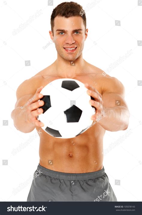 Happy Muscular Young Man Holding Soccer Ball Over White Background