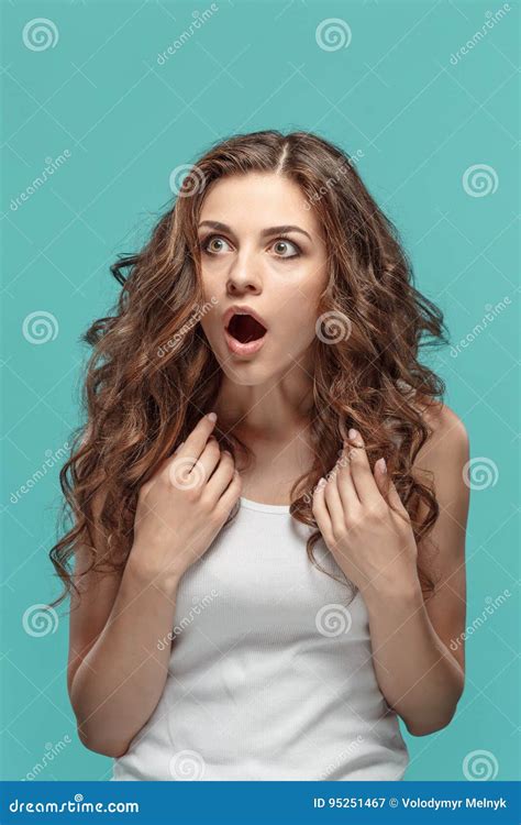 Portrait Of Young Woman With Shocked Facial Expression Stock Image