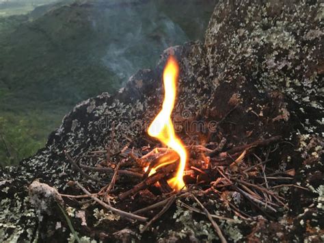 Fire Burning On Rock During Sunset In Waimea Canyon On Kauai Island Hawaii Niihau Island In