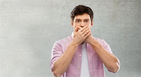 Shocked Young Man Covering His Mouth By Hands Stock Photo Image Of
