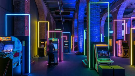 Game Ons Neon Filled Exhibition Design Paid Homage To 80s Video Games