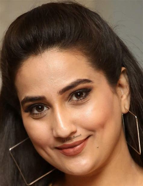 indian girl tv anchor manjusha beautiful earrings face closeup tollywood boost show photos