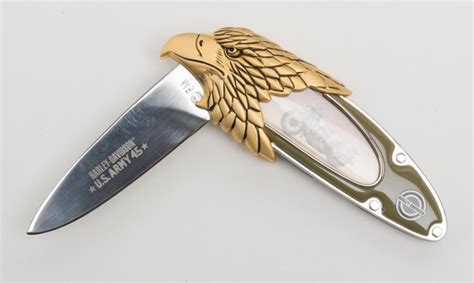 The eagle's head on the knife is anthracite and the blade is made of stainless steel. Lot of 4 Franklin Mint Collector folding knives in the ...