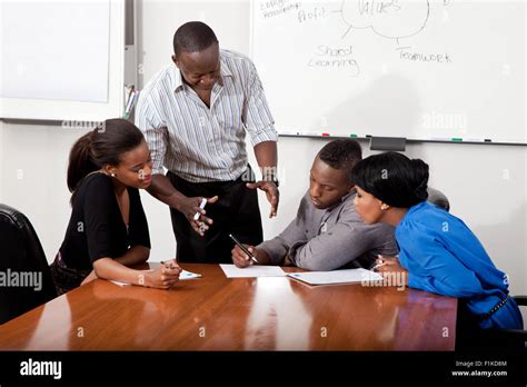 Overall Shot Of A Boardroom Meeting Involving Black Business People