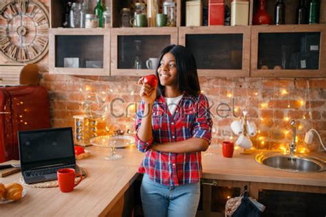 Cheerful Black Woman Cooking On The Kitchen Stock Photo Crushpixel