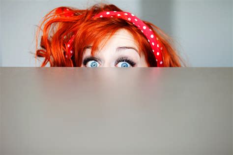 Funny Girl Hiding Behind A Table Stock Photo Download Image Now Istock
