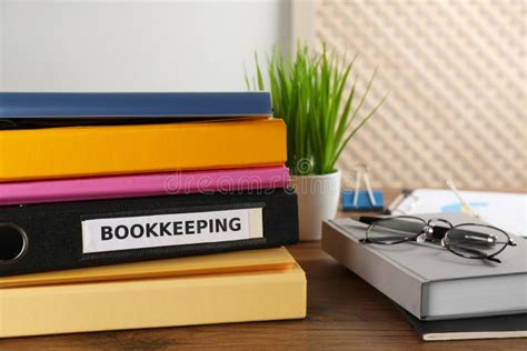 Folders And Stationery On Desk In Office Bookkeeper S Workplace Stock