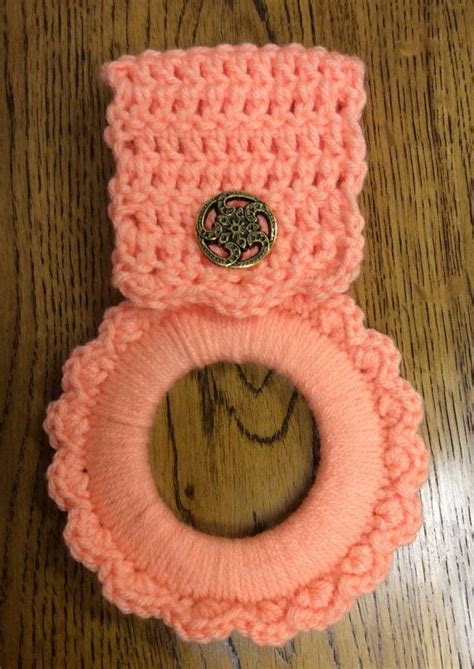 I've got a quick and fun little free pattern for you today. Kitchen towel hanger, oven towel hanger, crochet towel ...