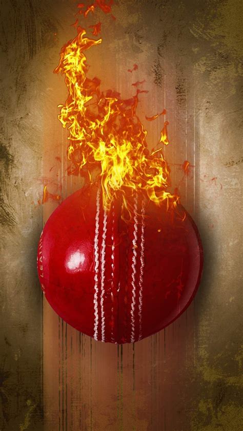 A Red Ball With Flames Coming Out Of It On A Grungy Wall Background