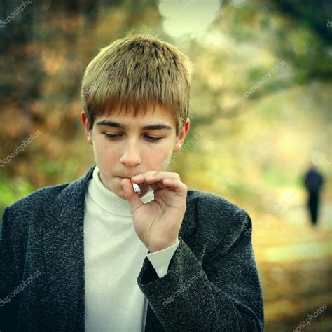Boy Smoking — Stock Photo © Sabphoto 42848619
