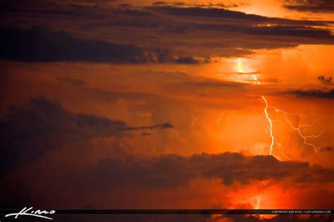 Lightning Storm Over Sea Jupiter Inlet Red Clouds Royal Stock Photo