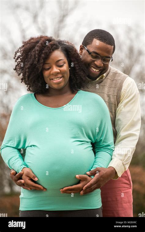 Portrait Of A Happy Pregnant African American Couple Stock Photo Alamy