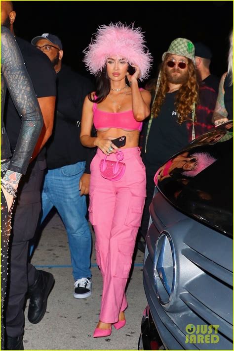Megan Fox Wears Pink Fuzzy Bucket Hat To Machine Gun Kellys Concert
