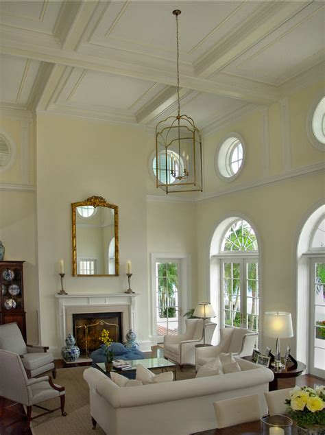 Interior Fetching High Ceiling Living Room In White Color Scheme With