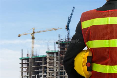 Hand Or Arm Of Engineer Hold Yellow Plastic Helmet Stock Image Image