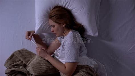 Sad Woman Crying Reading Old Messages On Smartphone Lying In Bed Memories Stock Image Image