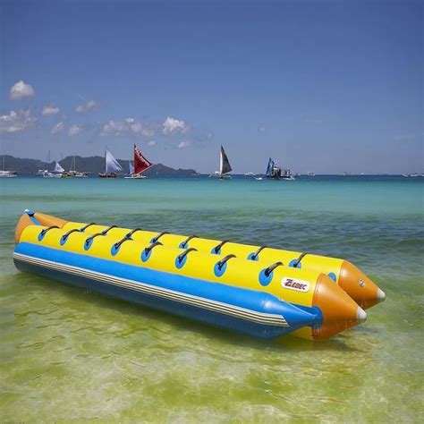 Inflatable Banana Boat 8 People Playing On The Beach Surf Riding Water