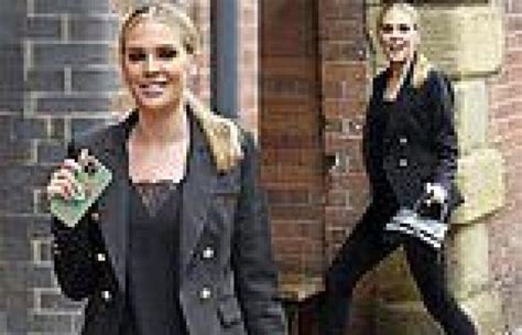 danielle lloyd cuts a chic figure in a black businesswear ensemble as she heads