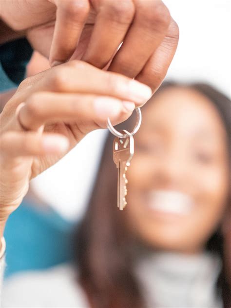 Person Holding A Key · Free Stock Photo