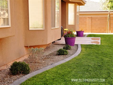 Welcome guests with flower beds that complement your home. Backyard design finishing the details.