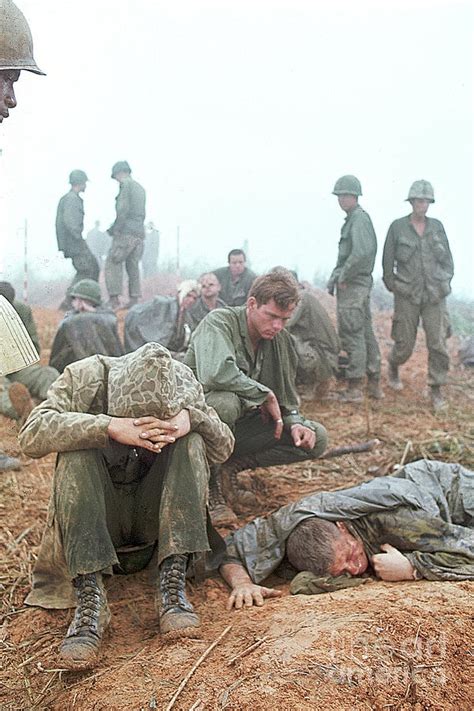 Wounded American Soldiers Await By Bettmann