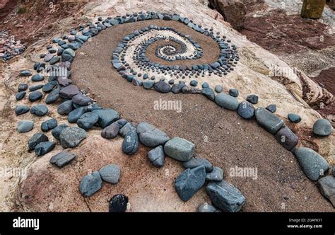 Stone Or Rock Sculpture Spiral Pattern On The Beach Dunbar East