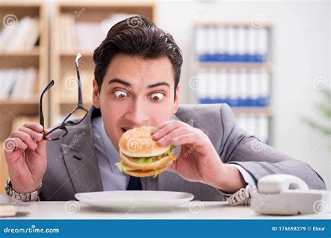 Hungry Funny Businessman Eating Junk Food Sandwich Stock Image Image