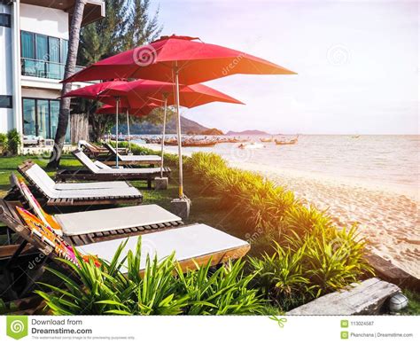 White Chair And Umbrella On Summer Beach Stock Image Image Of Scenic Sunrise 113024587