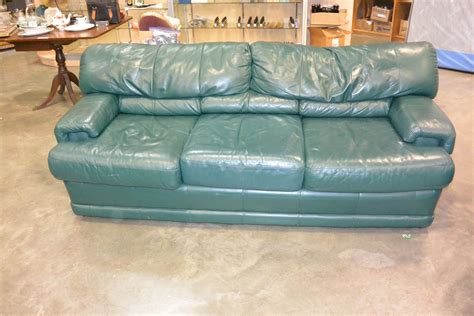 Browse all the arm chair options or narrow down by price, colour or size. GREEN LEATHER SOFA AND ARMCHAIR