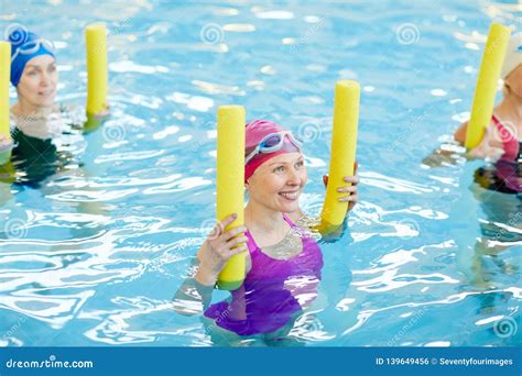 Adult Women Working Out In Water Stock Photo Image Of Smiling