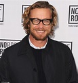 Simon Baker, 45, has still got it as he wears his signature thick ...
