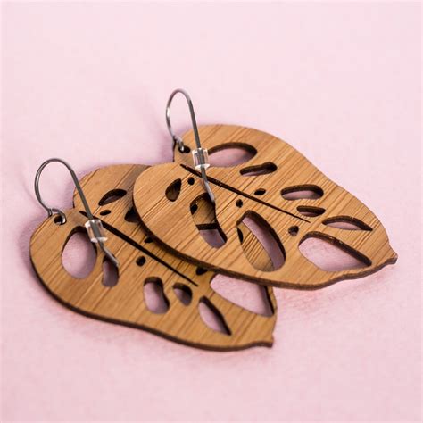 Check out our full guide on growing it: Monstera Adansonii Earrings - Buttermint